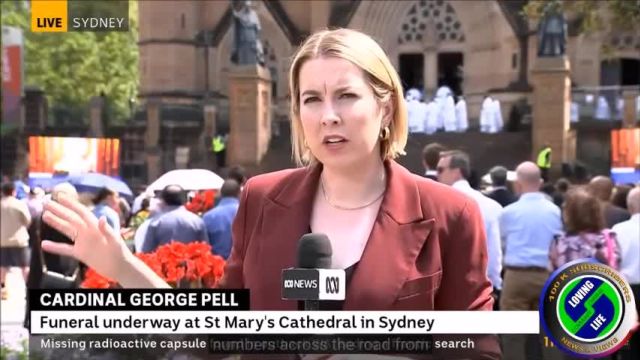 LGBTQ protestors gather outside the funeral service for Cardinal George Pell in Sydney, Australia